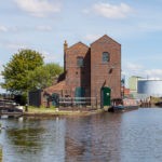 The Titford Canal - Oldbury Top Lock and the Pump House. The narrowboat on the right is moored at the Tat Bank Branch, a feeder to Rotton Park (Edgbaston) reservoir that is navigableonly for a short length.