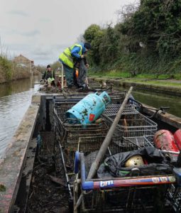Workboat loaded with scrap metal from the canal on the BCN Cleanup Weekend 2020